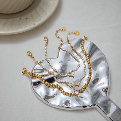 Luxurious 18K Gold Heart and Diamond Beaded Bracelet