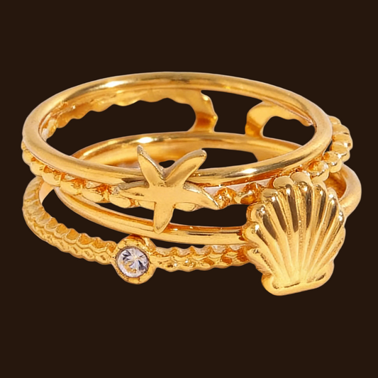 Multi-layered starfish shell open 18k gold ring
