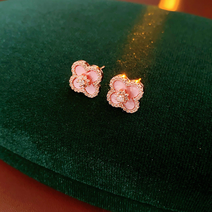 Luxury diamond four-leaf clover stud earrings in 18k gold